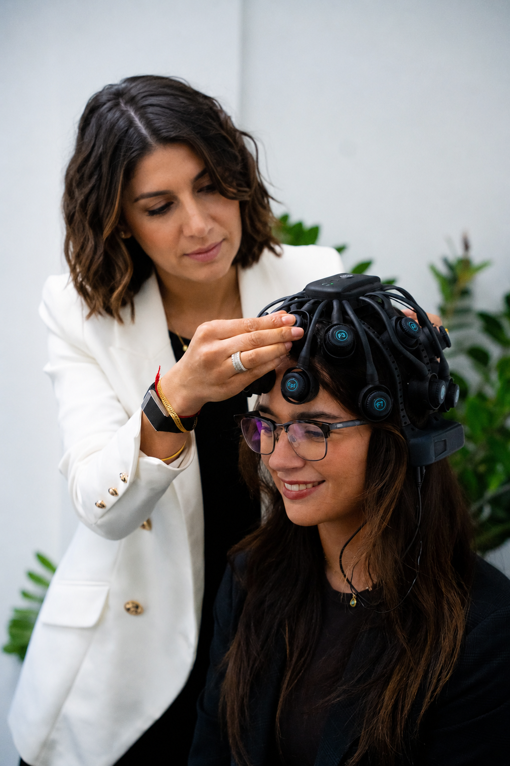 Next Health practitioner fitting a patient with a QEEG dry EEG headset