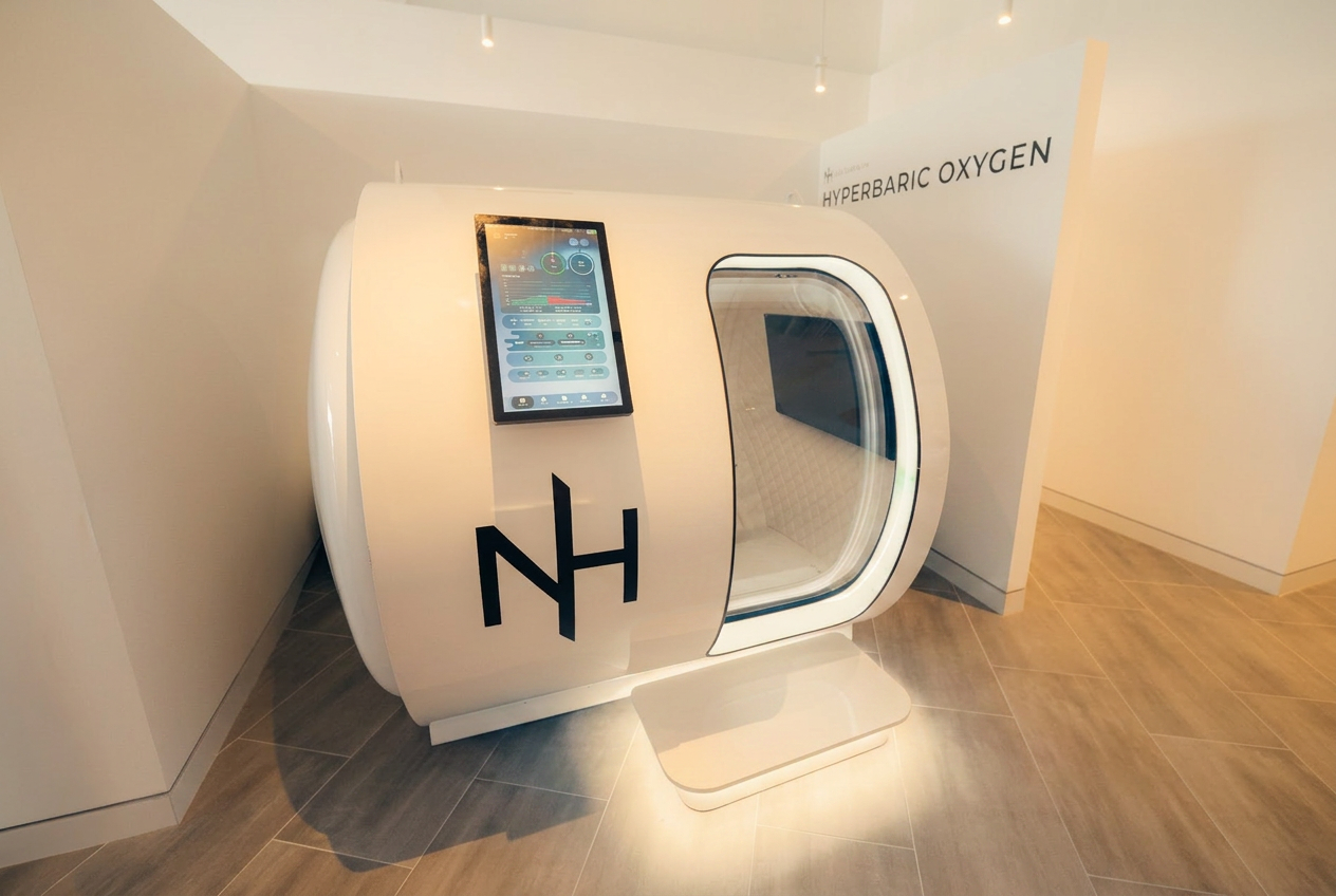 Hyperbaric oxygen chamber with member reclining inside, warm interior lighting